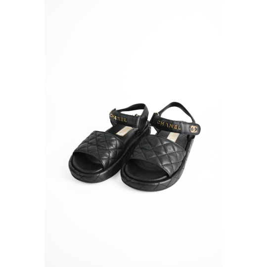 Sandal Chanel Quai Dán Da Chần Trám Đen GHW